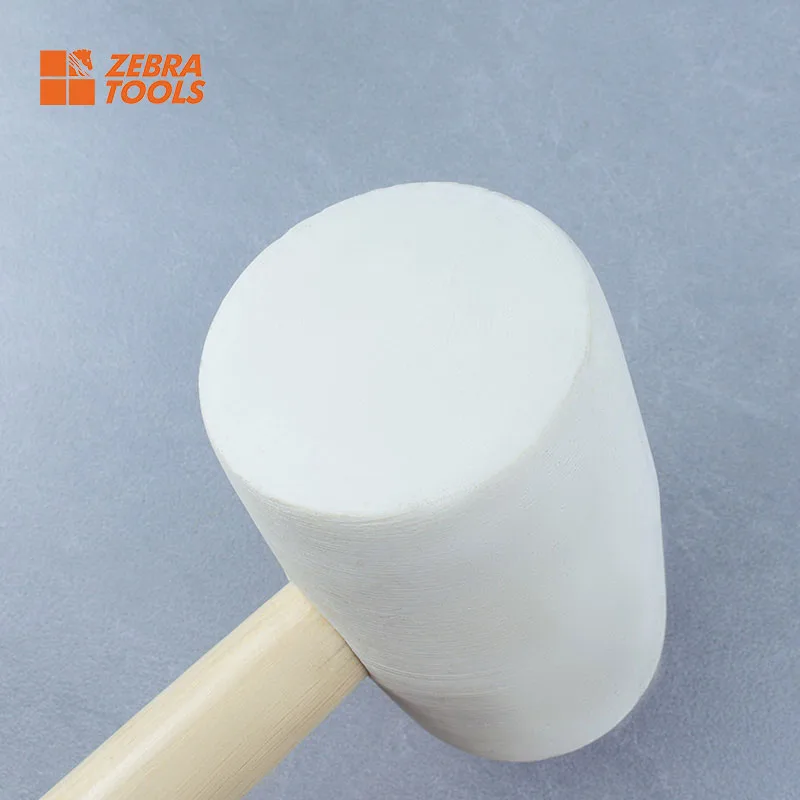 Tile mallet hammer rubber head — soft face taps large-format porcelain flush during installation